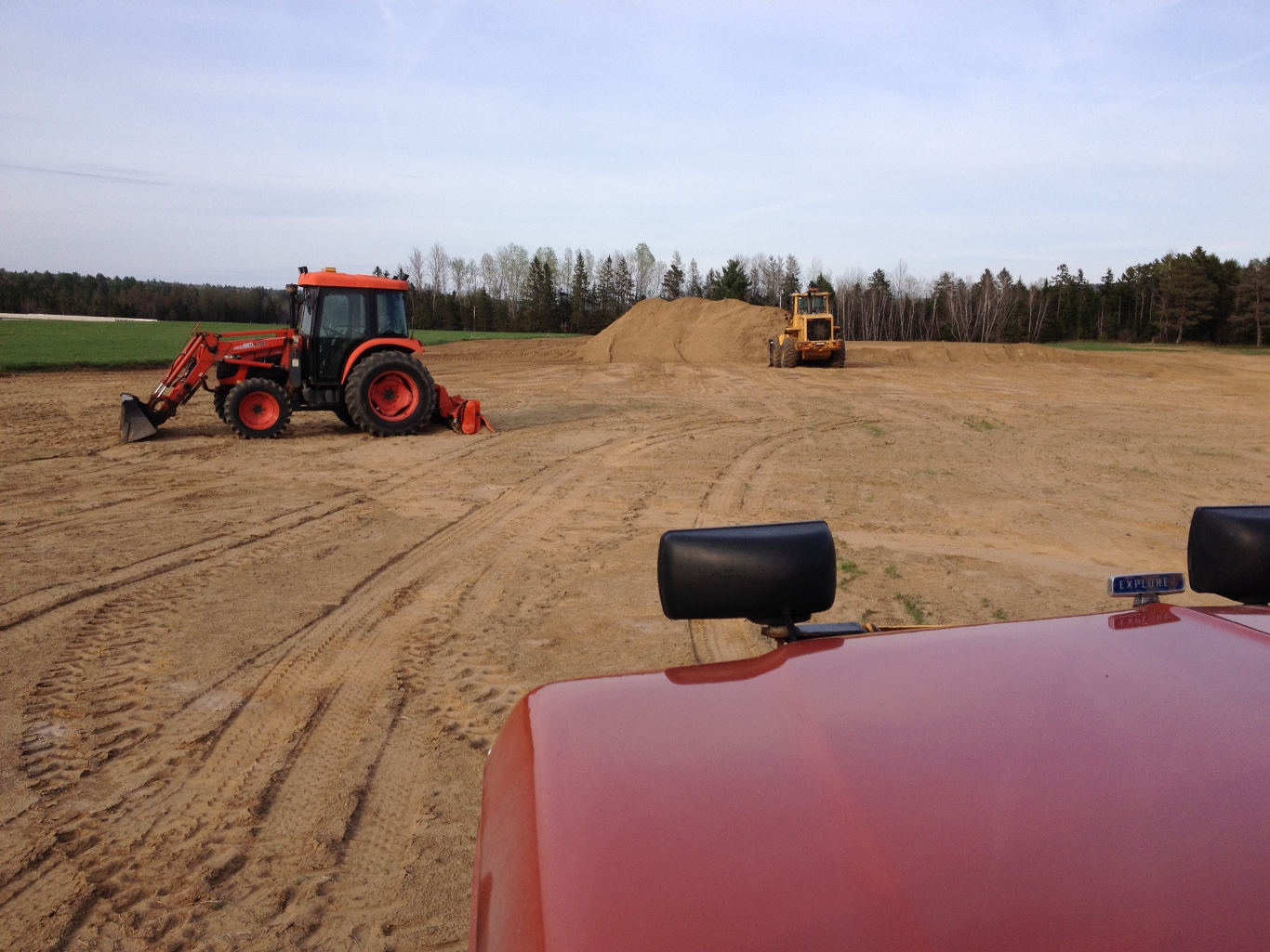 ABC Ranch Tractors and equipment loading soil